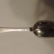 Onderaanzicht van de geboortelepel van A.J. vd Heide, met meesterteken; rear view of the birth spoon of A.J. van der Heide, incl. master's mark. Onderaanzicht van de geboortelepel van A.J. vd Heide, met meesterteken; rear view of the birth spoon of A.J. van der Heide, incl. master's mark.